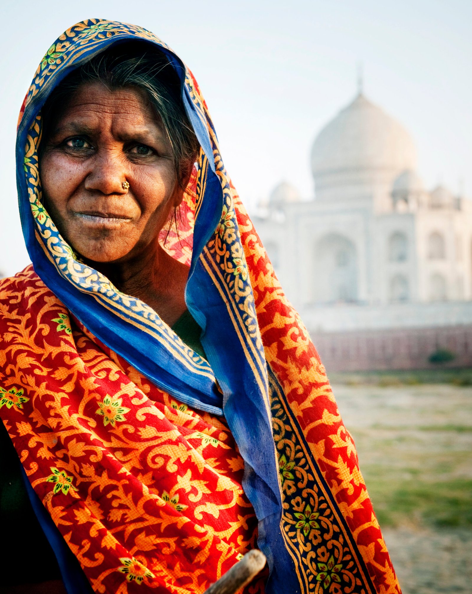 Indigenous Indian Woman And Taj Mahal Backgroud Concept