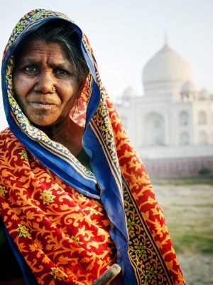 Indigenous Indian Woman And Taj Mahal Backgroud Concept